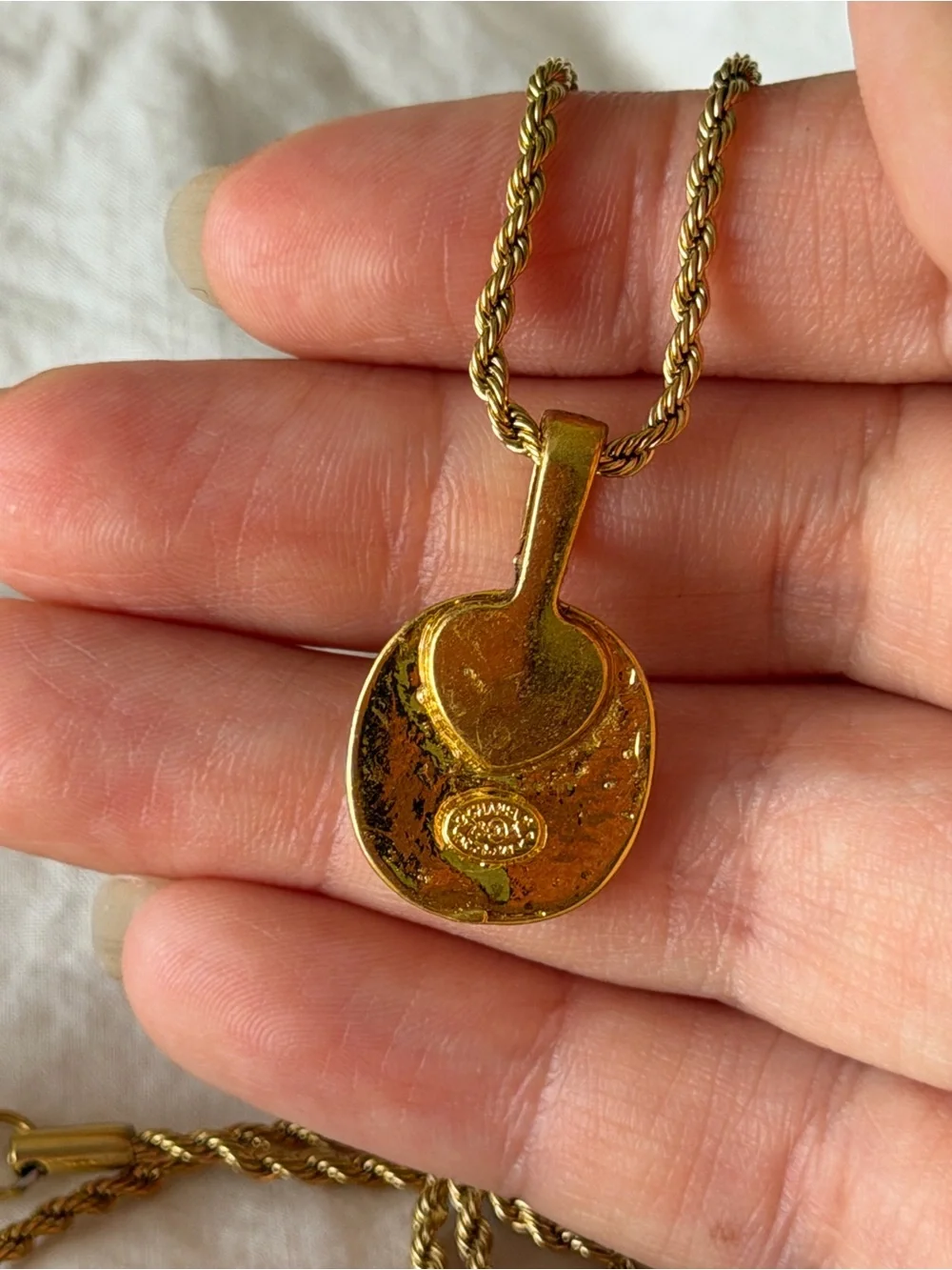 CHANEL Gold and Black Oval CC Pendant Necklace on Rope Chain